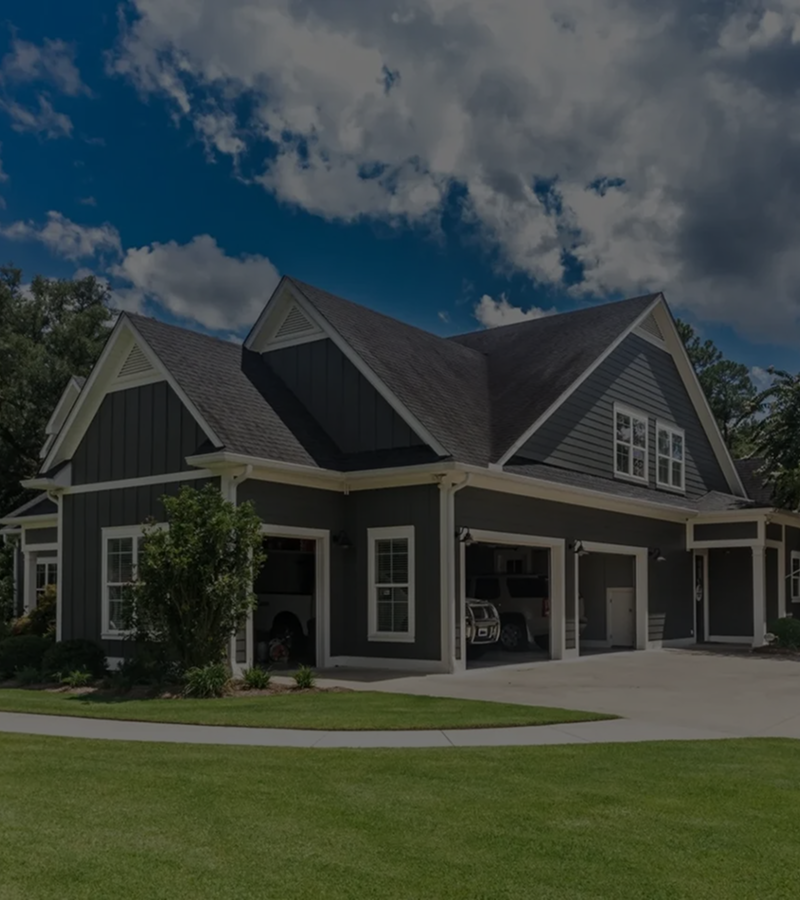 Two-story house under blue sky